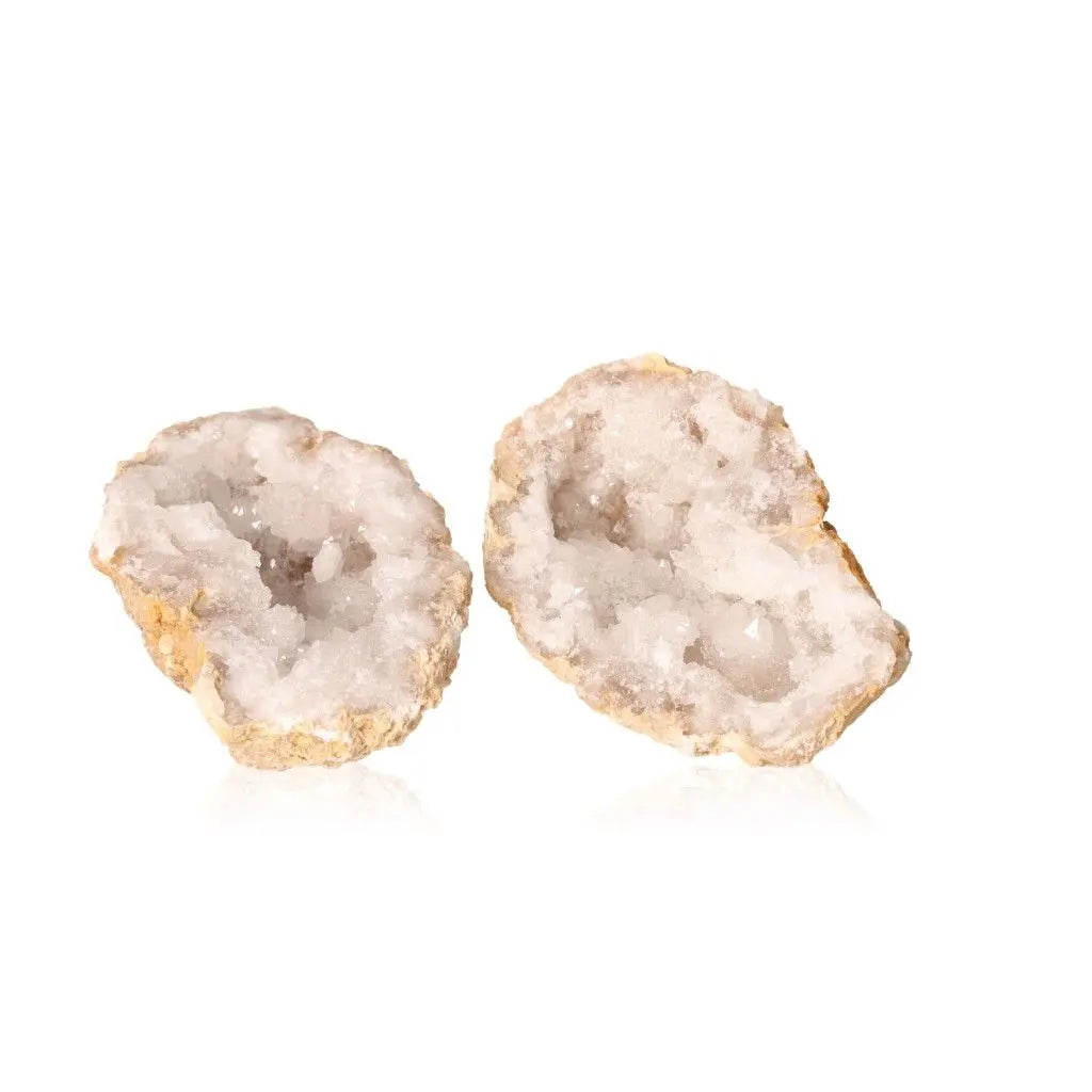 Quartz geode split open displaying sparkling white crystals, 700-900g, natural stone with rugged exterior on white background.
