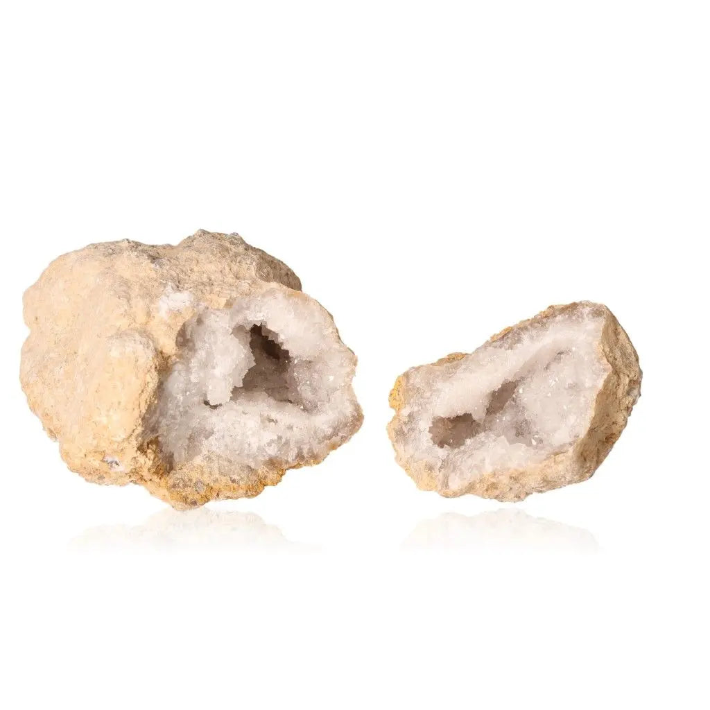 Quartz Geode with sparkling white crystals, weight 700-900g, showcasing an earthy exterior with a mesmerizing inner beauty.