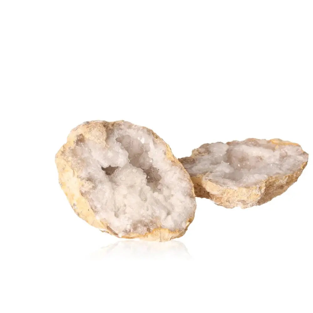 Open quartz geode displaying cloudy white crystals, with an earthy exterior, captivating natural beauty in a 700-900g piece.