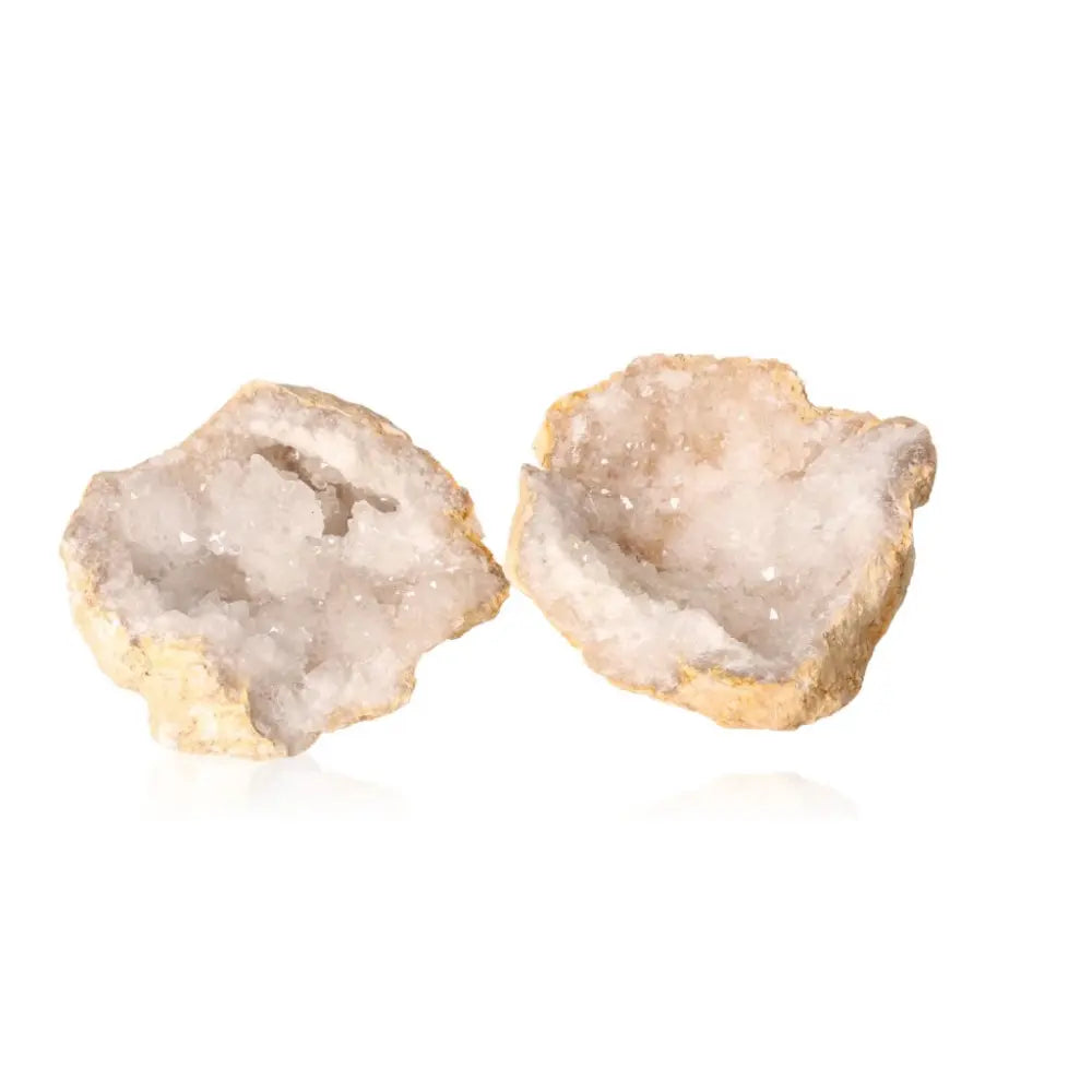 Open Quartz Geode revealing sparkling cloudy white crystals inside, weighing 700-900g, known for purification and amplification properties.