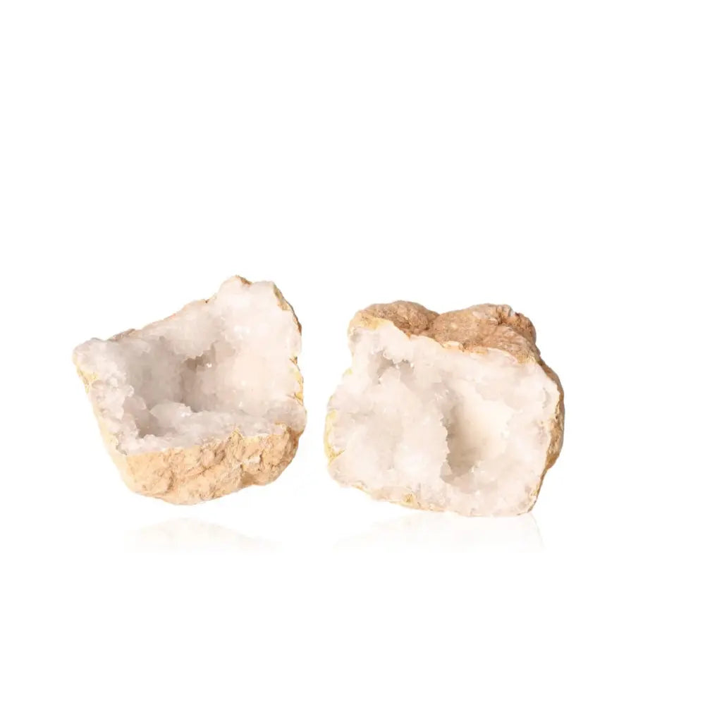 Open milky quartz geode showcasing sparkling crystals and earthy exterior, 700-900g, perfect for aesthetic charm and tranquility.