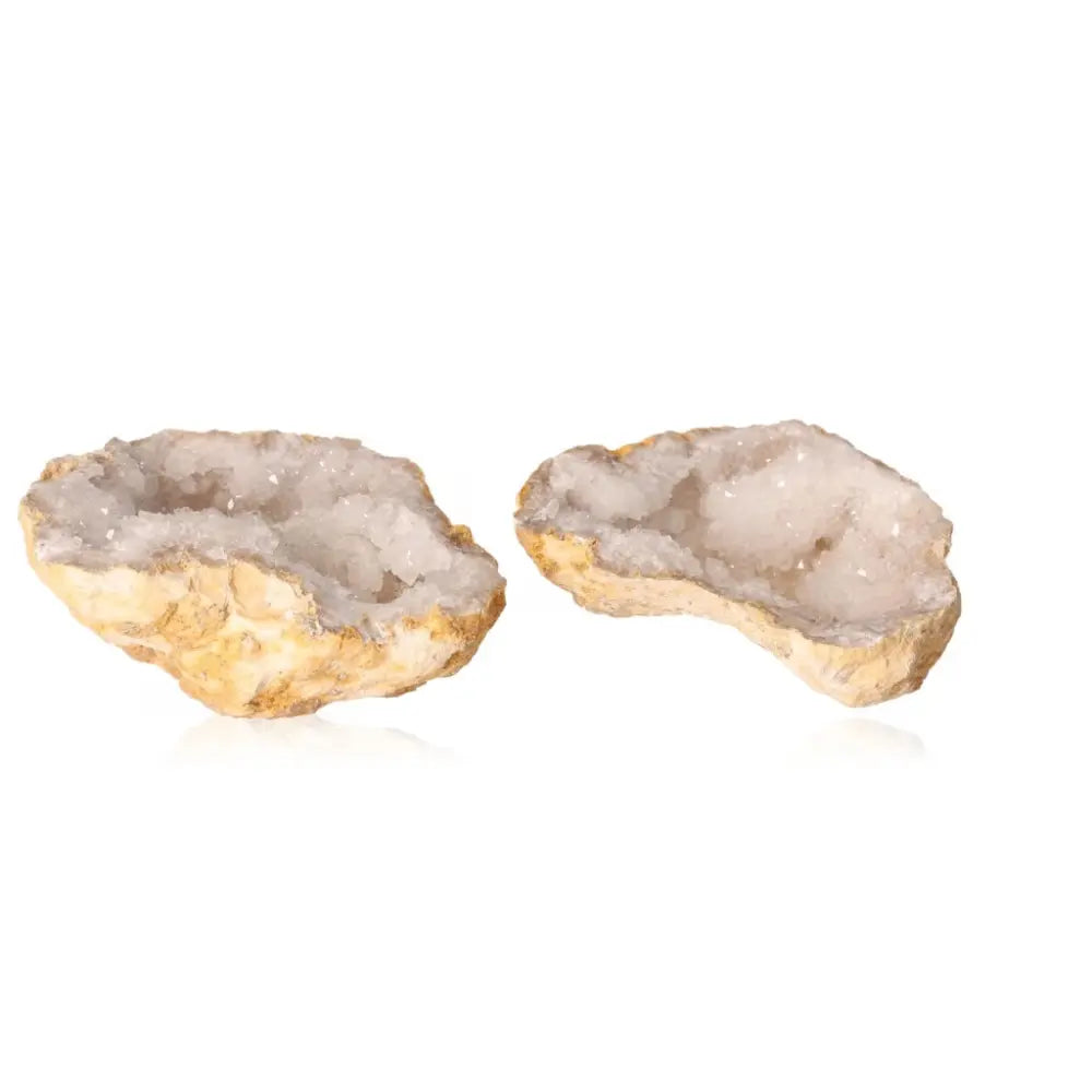 Quartz geode with milky white crystals, weighing 700-900g, showcasing its rugged outer shell and sparkling interior.