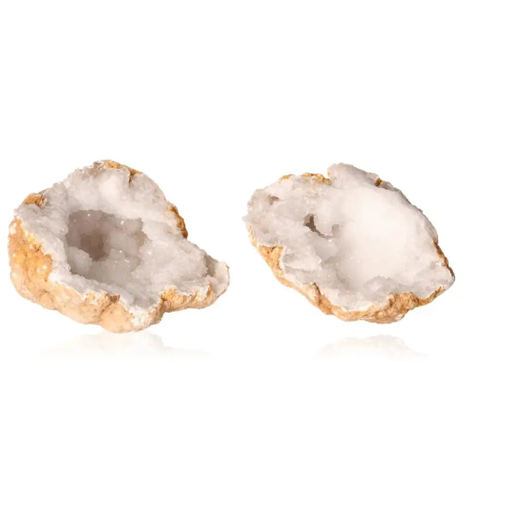 Quartz Geode weighing 700-900g with rugged shell revealing sparkling cloudy white crystals, embodying tranquility and clarity.