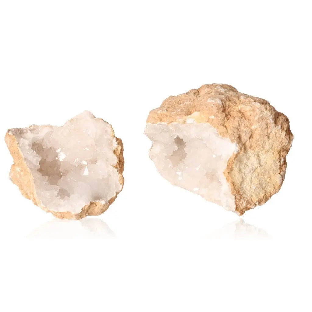 Quartz Geode (700-900g) displaying rugged exterior and sparkling white crystals, symbolizing nature's artistry and serenity.