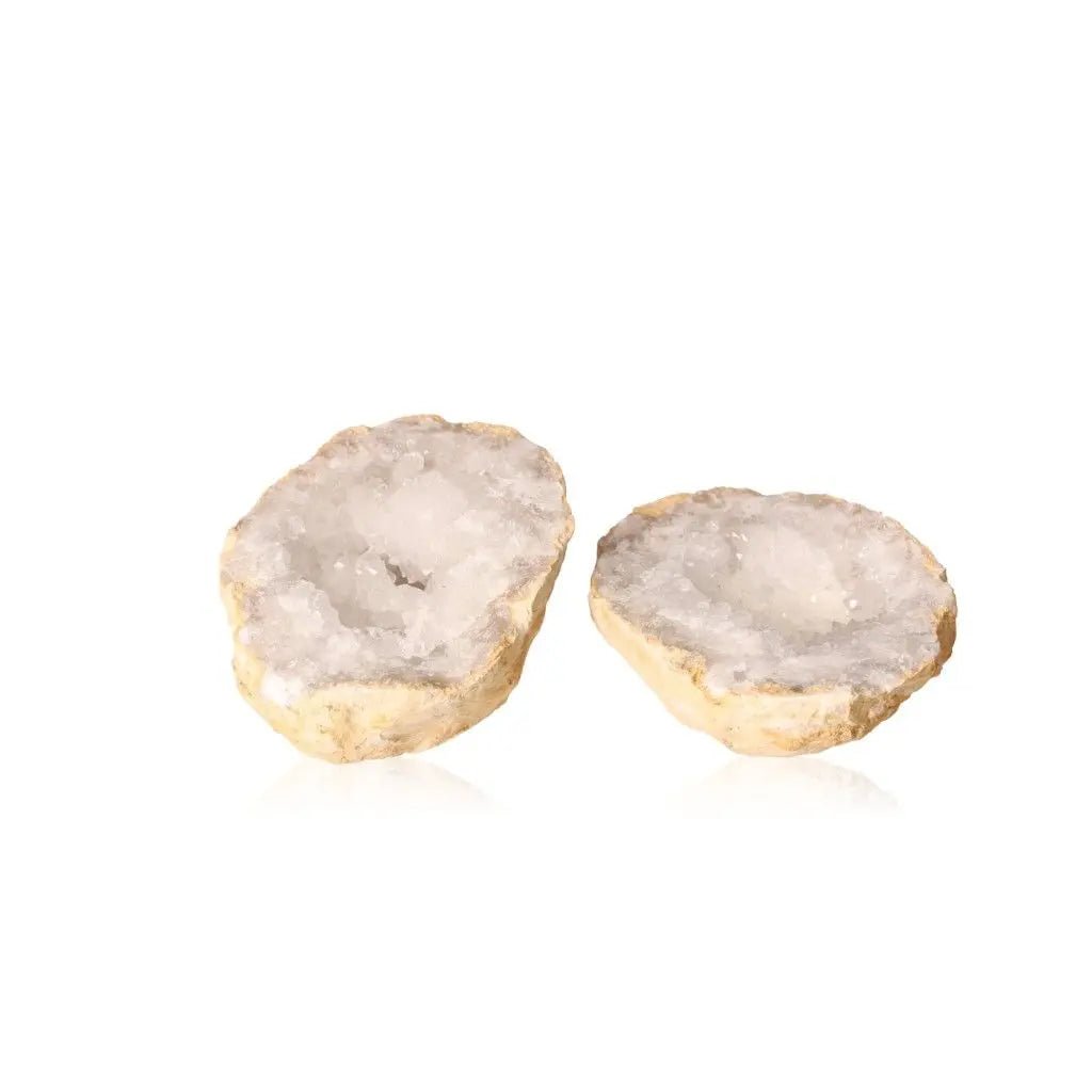 Quartz geode featuring milky white crystals and rugged, earthy shell, perfect for enhancing tranquility and clarity in any space.