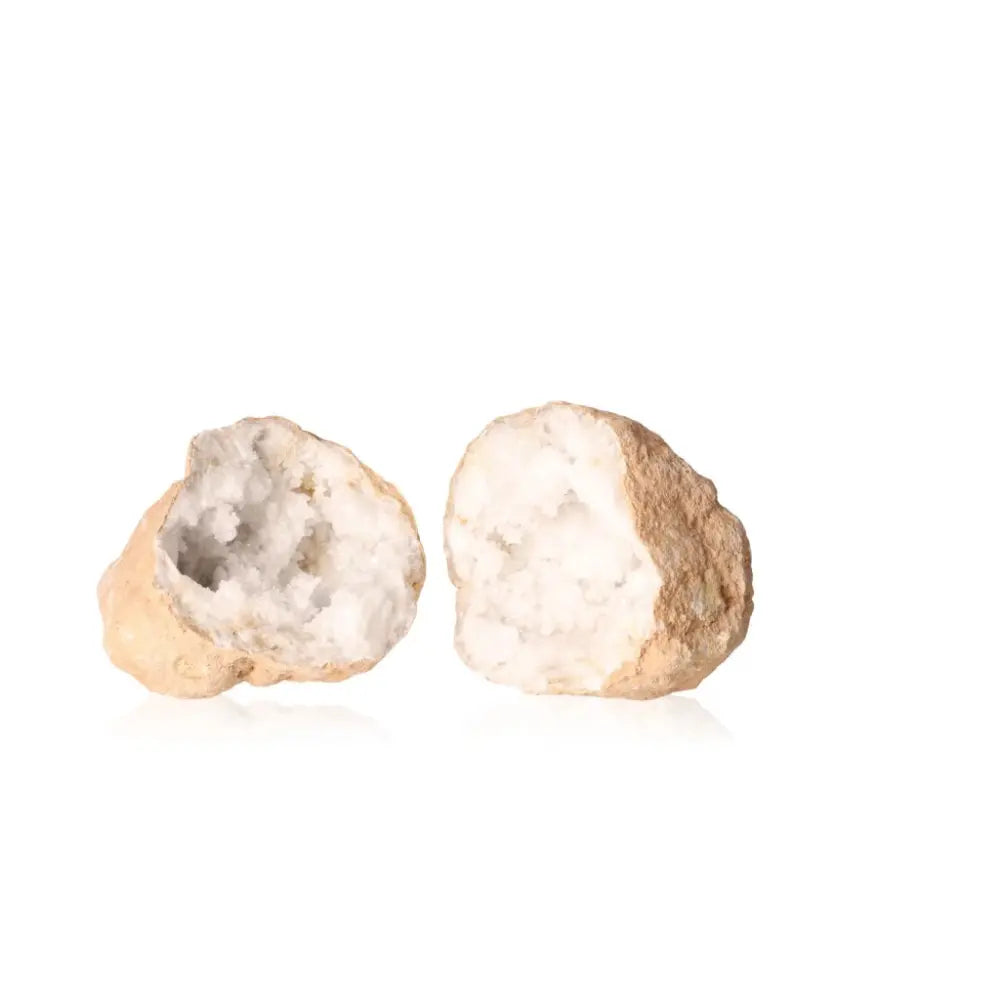 Quartz Geode showcasing rugged exterior and crystalline interior, 900-1200g, metaphysical energy enhancer.