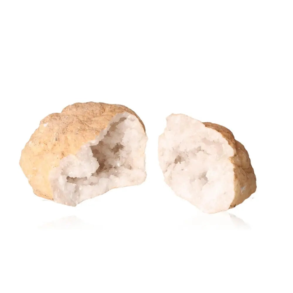Open quartz geode displaying sparkling white crystals inside a rugged exterior, weighing between 900-1200g.