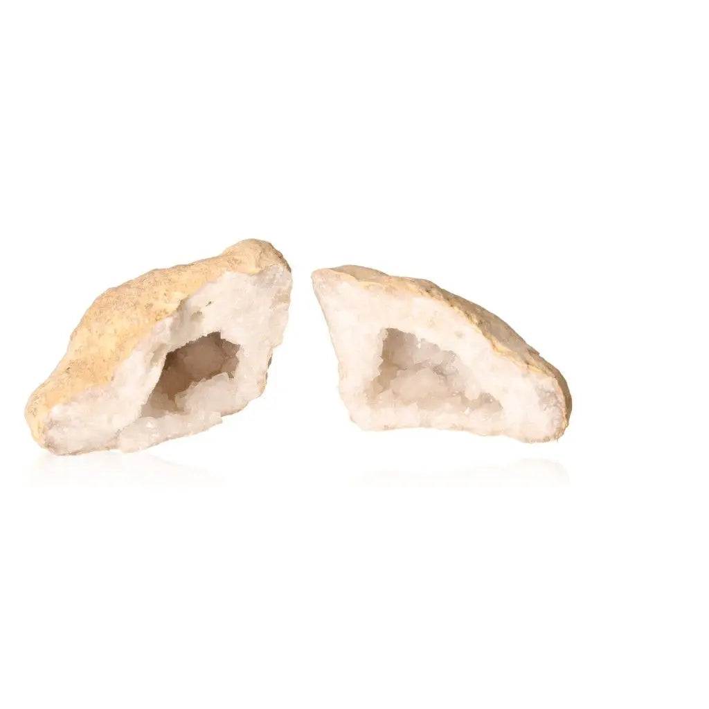 Quartz Geode split in half showing cloudy white crystals, weighing between 900-1200g, showcasing nature's artistry.