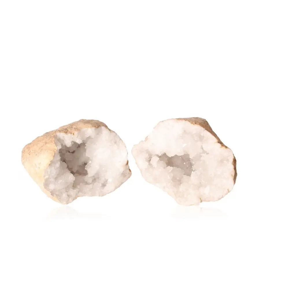 Quartz Geode showcasing milky crystals, weighing 900-1200g. This earthy rock opens to reveal nature's unique artistry and geological beauty.