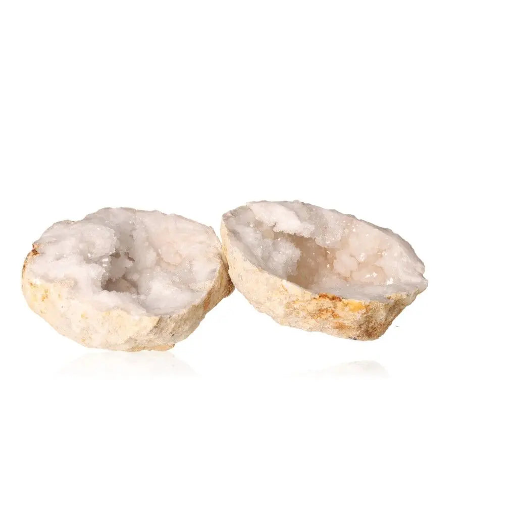 Open quartz geode displaying sparkling, cloudy white crystals inside a rugged shell, perfect for energy purification and amplification.