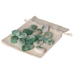Quartz Green Bi-Color Antistress Thumb Massager stones on a beige drawstring pouch, luxury product by Sylvia Crystals for relaxation.