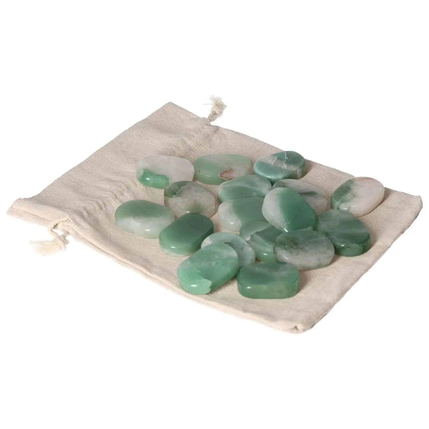 Collection of green and white quartz stones on a beige cloth, perfect for relaxation and stress relief.