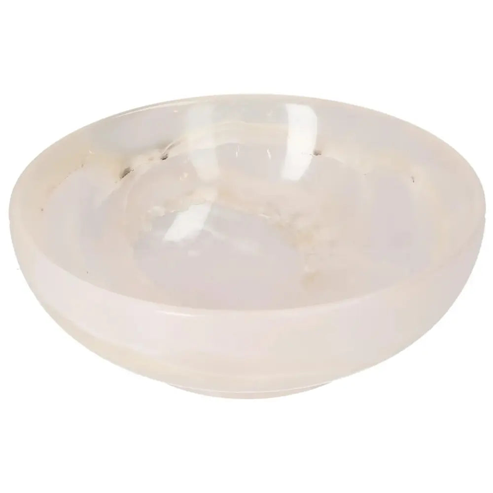 Rose Onyx Bowl with delicate veining, displaying a smooth, polished surface that captures light, adding elegance to any décor.