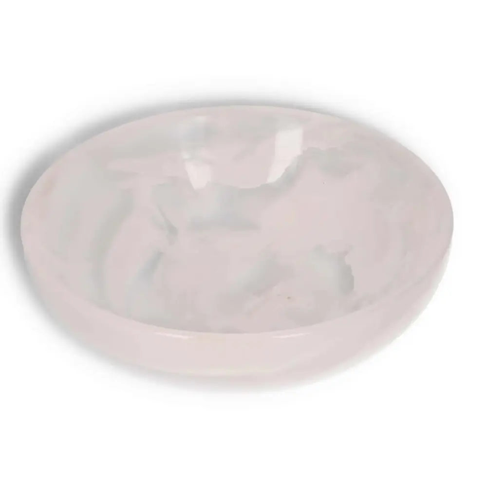 Elegant rose onyx bowl with smooth polished surface, showcasing unique veining and color variations, perfect for sophisticated décor.