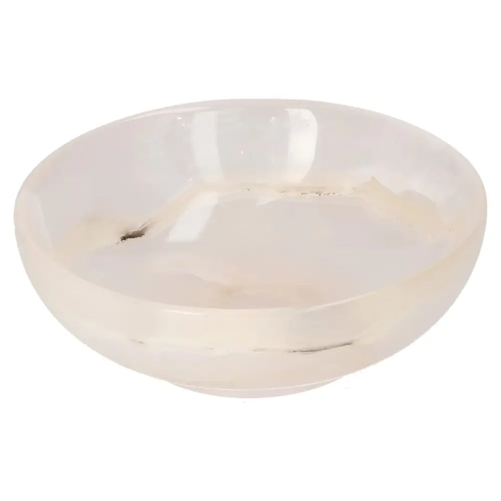 Rose Onyx Bowl with polished surface and delicate veining, showcasing unique color variations and warm, sophisticated elegance.