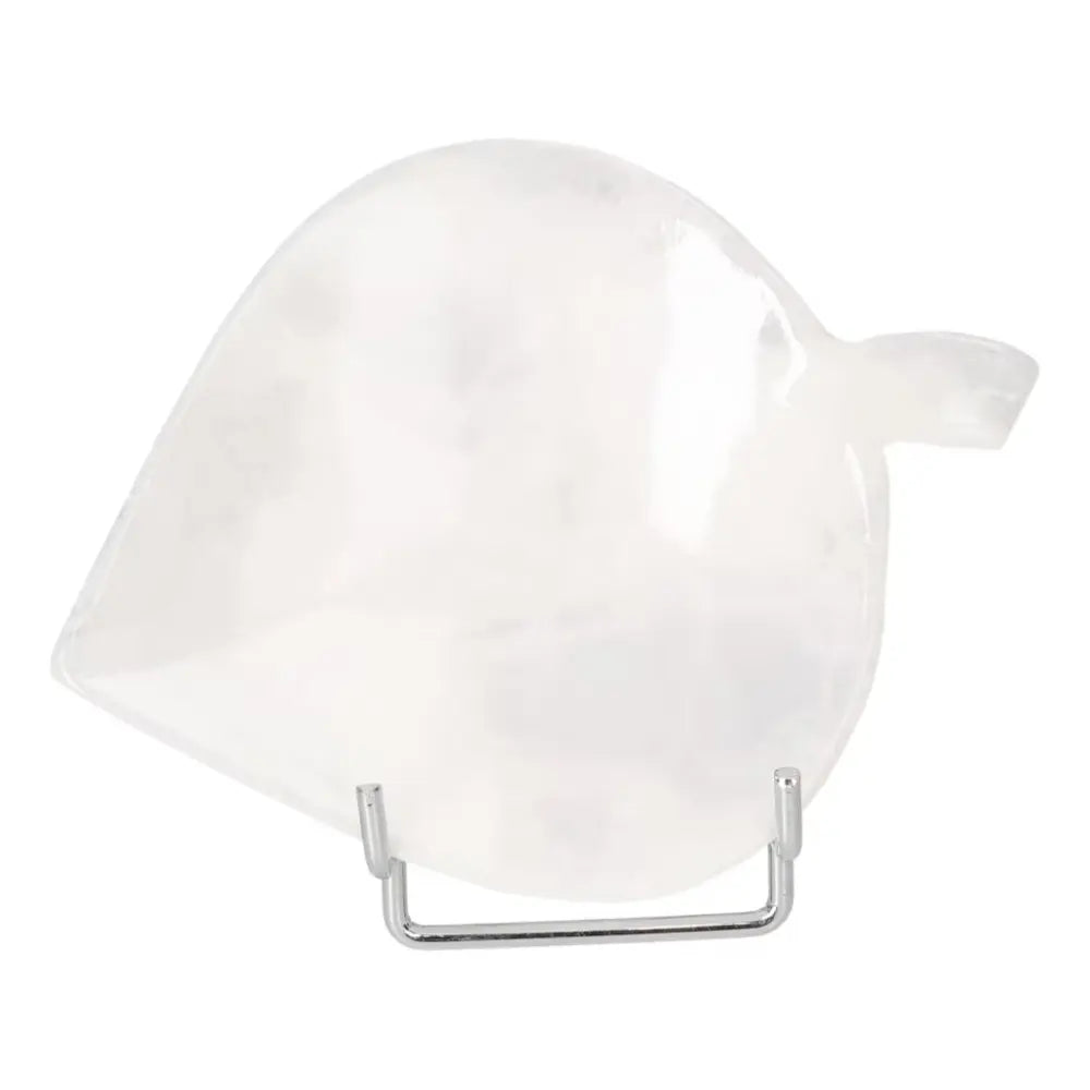 Smooth rose onyx platter with unique veining on display stand, perfect for elegant table settings and serving delicacies.