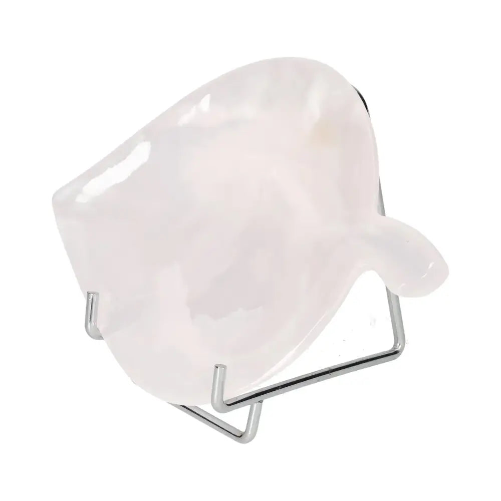 Rose Onyx Platter with delicate pink hues and natural veining, displayed on a metal stand, showcasing its polished, smooth surface.