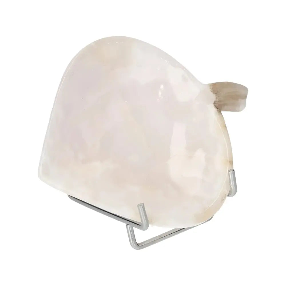 Rose Onyx Platter with unique veining on display stand, showcasing its natural elegance and polished surface.