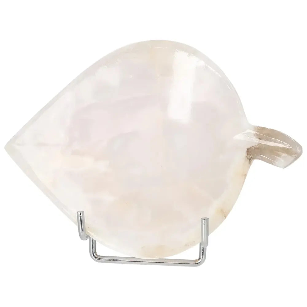 Rose onyx small platter with unique veining, polished surface, on display stand; elegant tableware enhancing natural beauty.