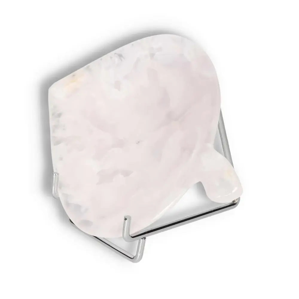 Elegant rose onyx platter showcasing unique color variations on a display stand, perfect for a sophisticated tablescape.