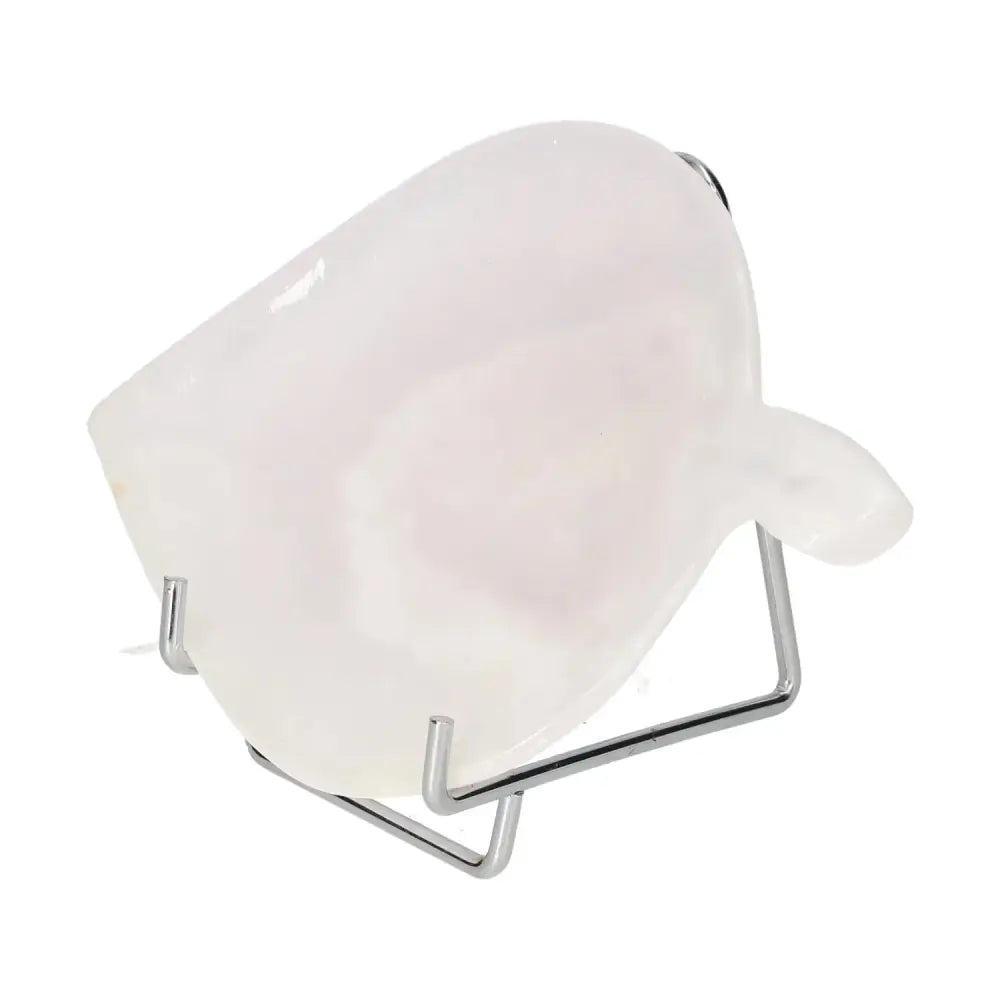 Rose Onyx Platter showcasing delicate hues and unique veining, a perfect blend of elegance and natural beauty on display stand.