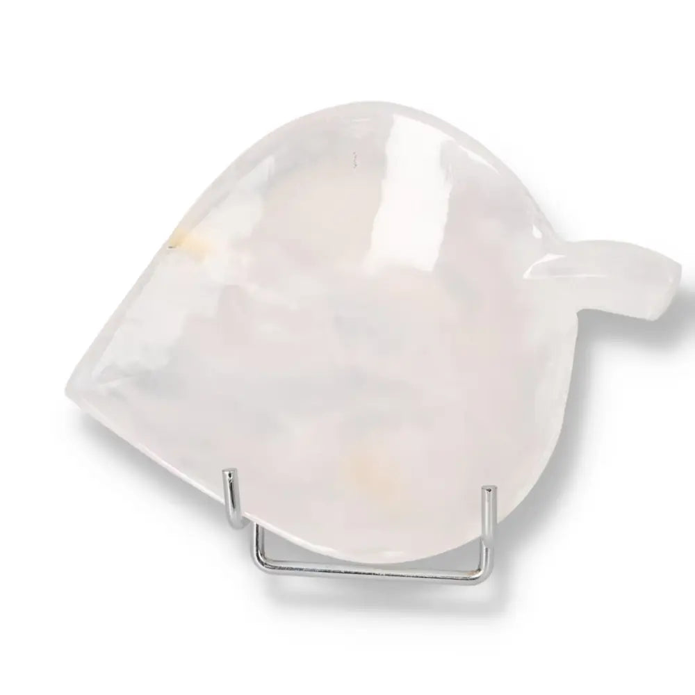 Elegant rose onyx platter showcasing unique veining, ideal for serving or decor. Polished surface reflects light beautifully.