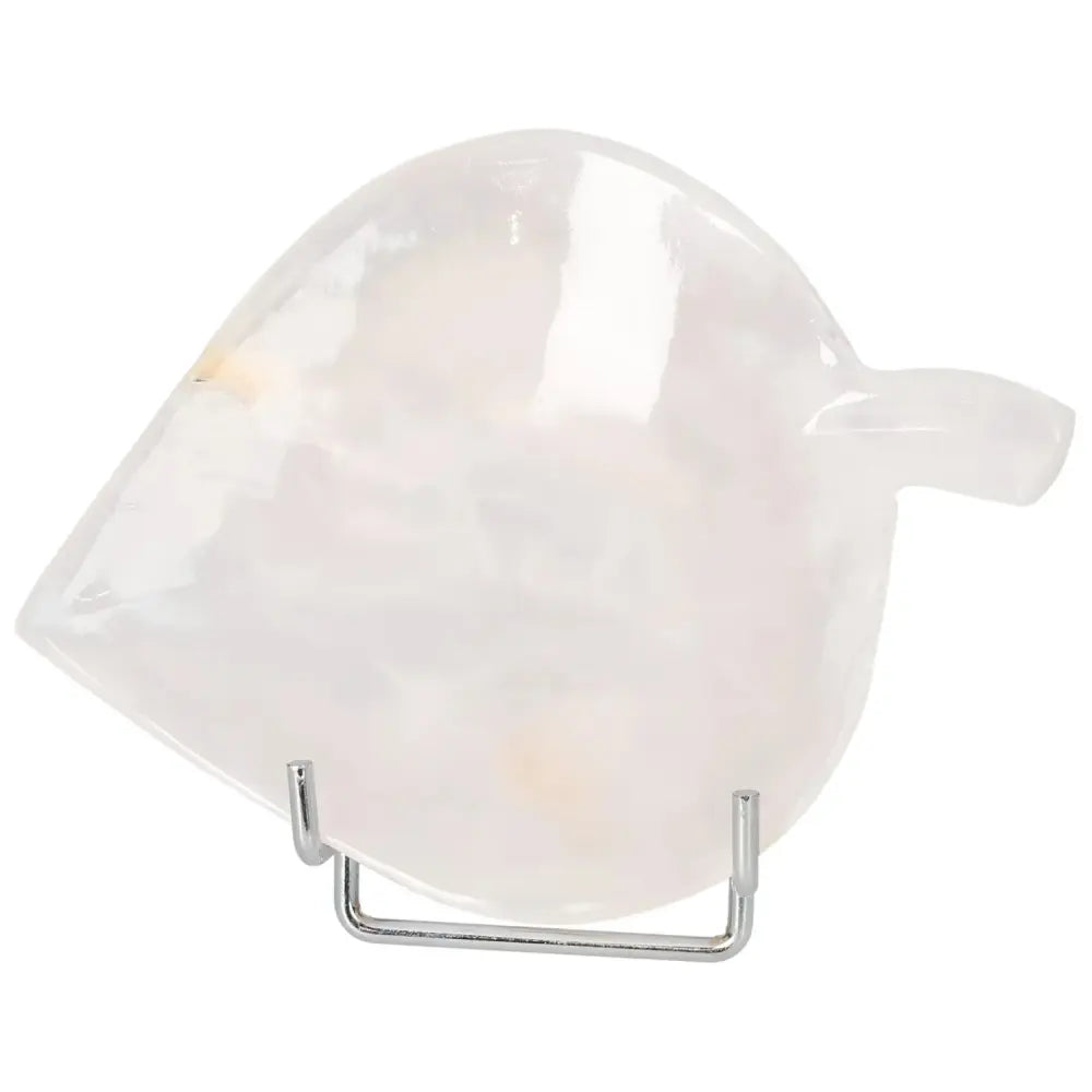 Rose Onyx Platter on display stand with smooth, polished surface showcasing unique rose-hued veining, perfect for elegant tablescapes.