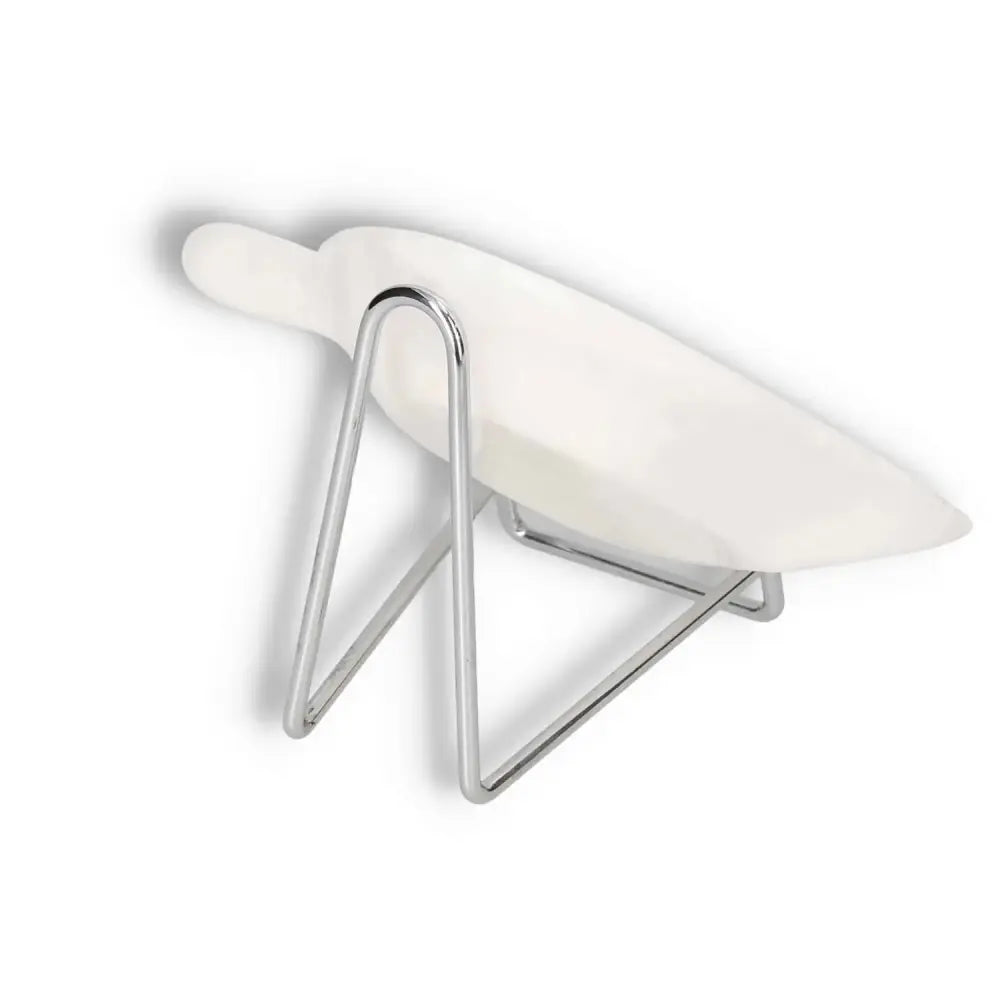 Modern white bowl with handle on a sleek metal stand, ideal for contemporary dining spaces.