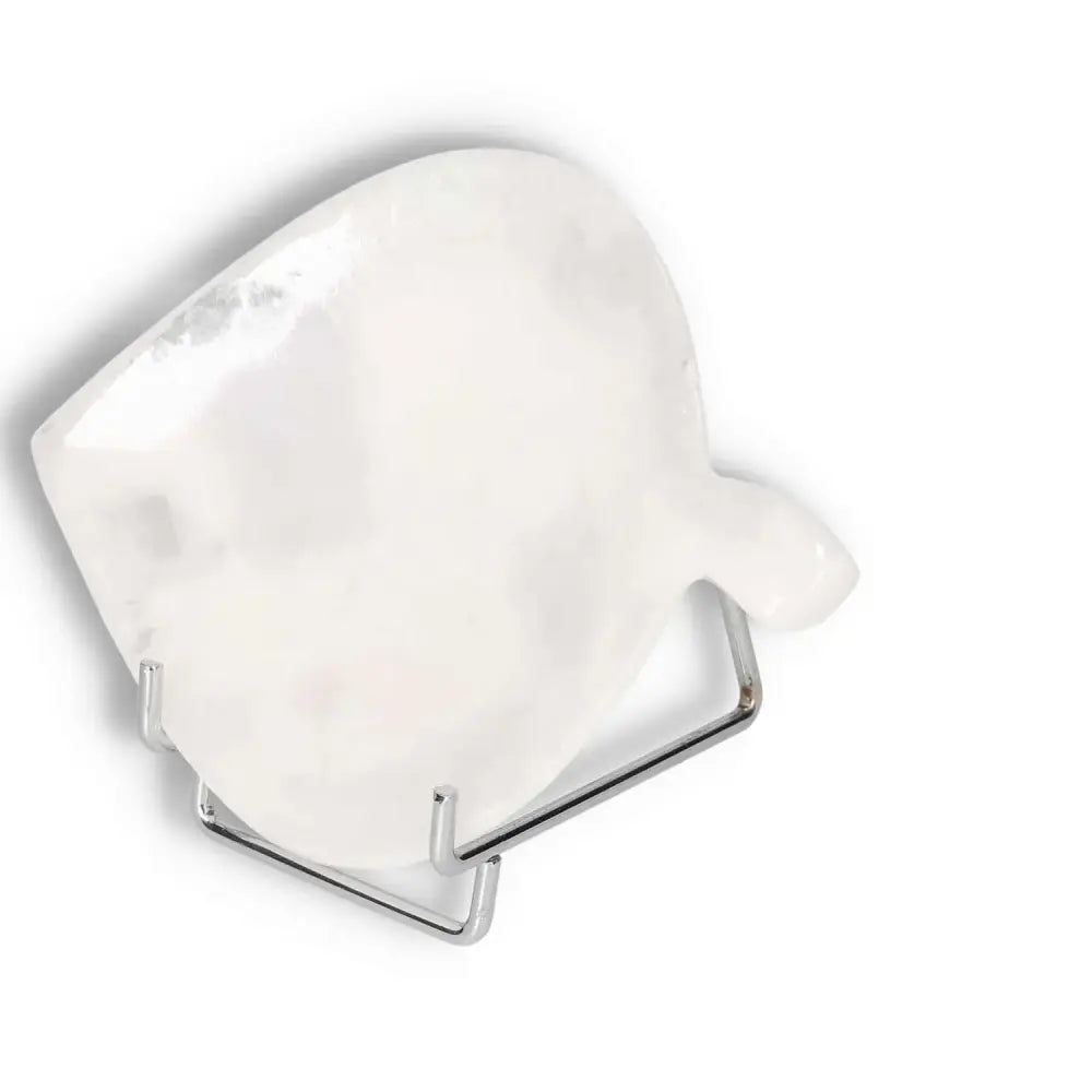 Rose Onyx Platter with unique color variations, showcasing a smooth polished surface on a metal stand for elegant table displays.