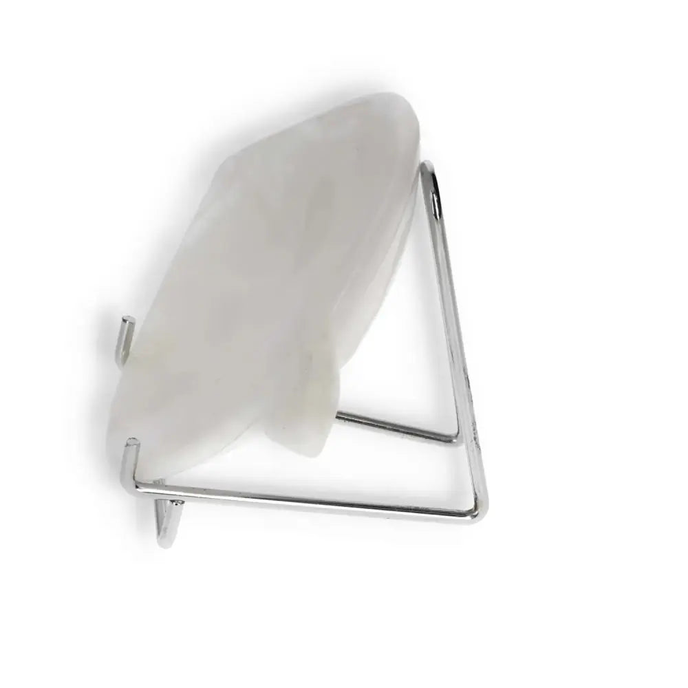 Side view of a Rose Onyx Platter showcasing its elegant stand and unique color variations in polished rose-hued onyx.