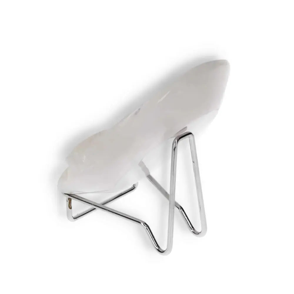 Side view of a rose onyx platter with unique veining, placed on a metal stand, showcasing its polished surface and elegant design.