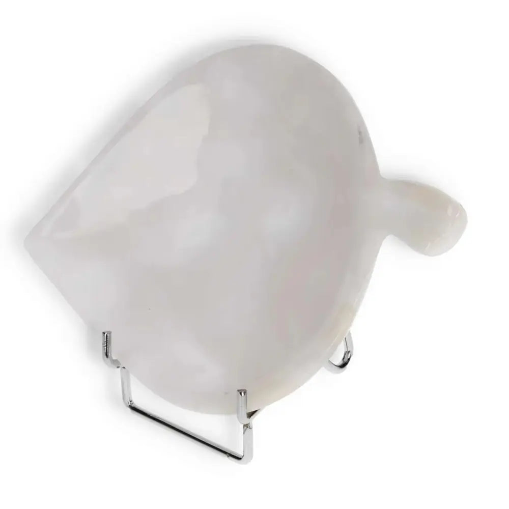 Polished rose onyx platter with unique veining, displayed on a stand. Elegant table accessory for serving or decor.