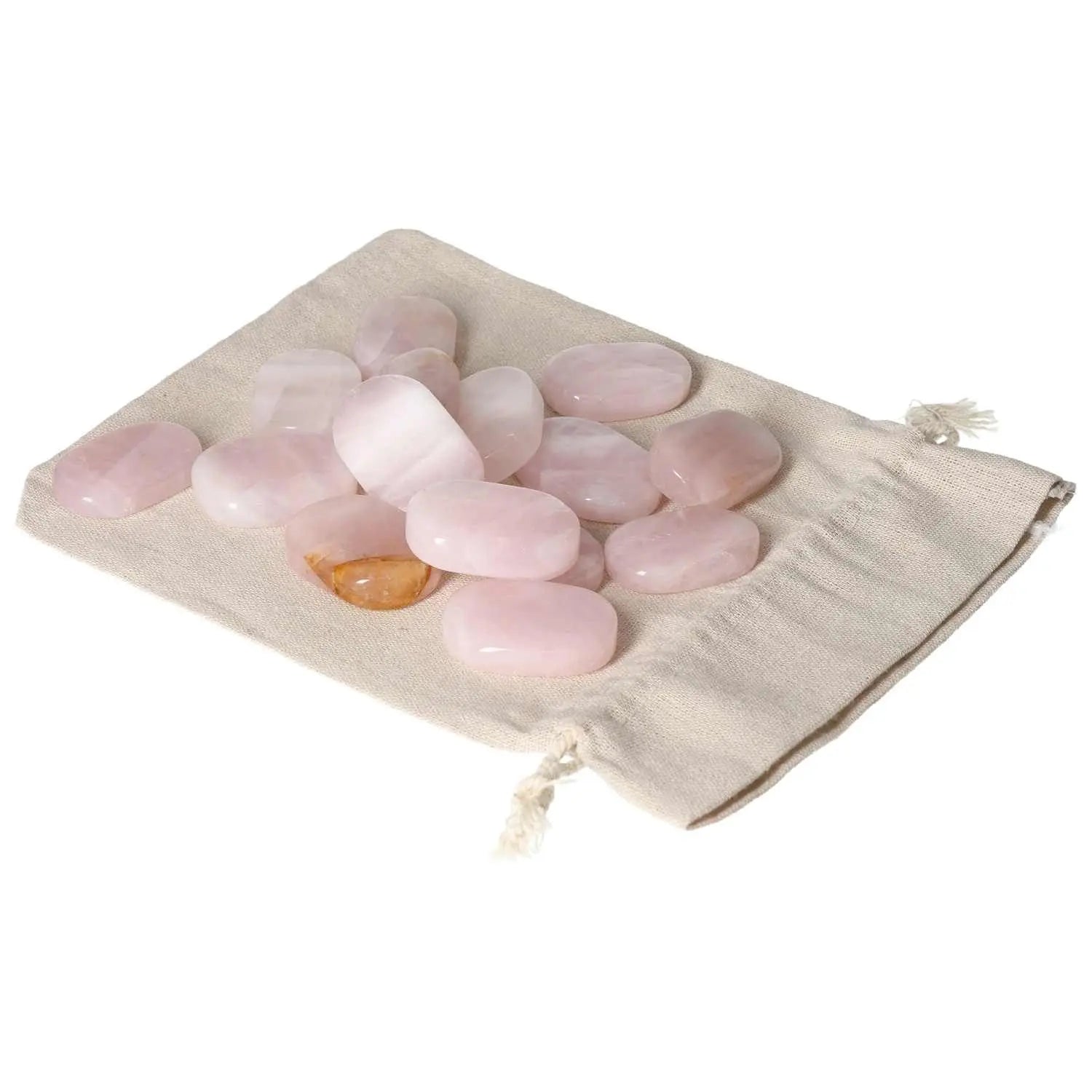 Rose Quartz stones on a beige cloth, ideal for stress relief and emotional healing from Sylvia Crystals.