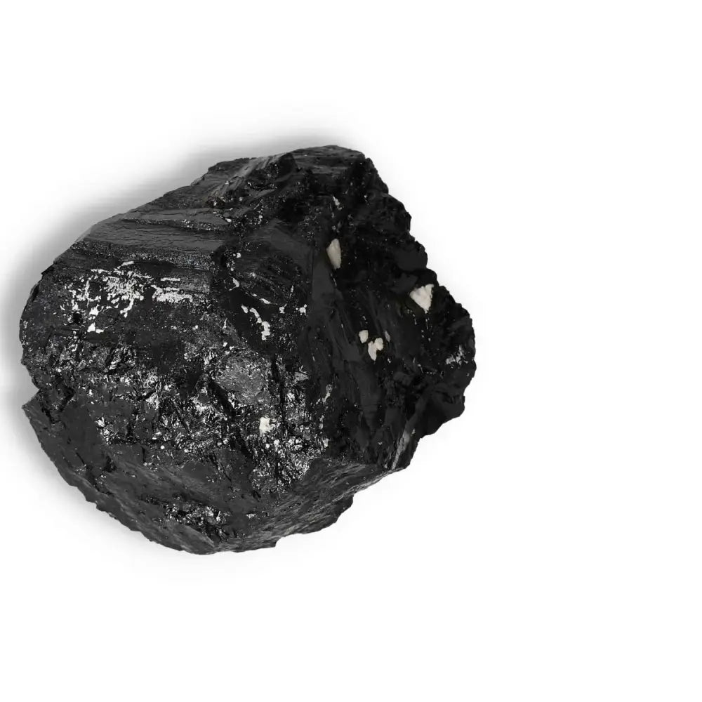 Rough Black Tourmaline Druze crystal, known for transforming negative energies and offering protection, from Sylvia Crystals.