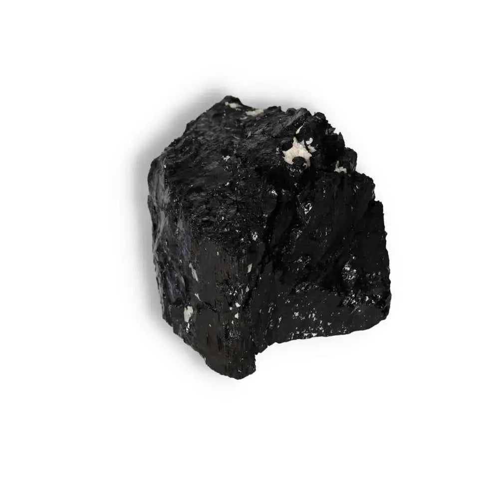 Rough Black Tourmaline Druze crystal from Sylvia Crystals, known for cleansing energy and enhancing root chakra connections.