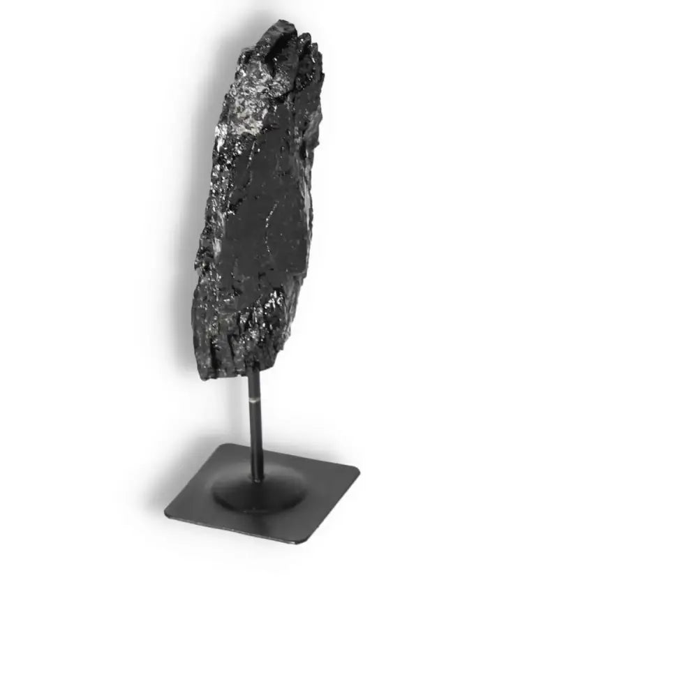 Rough Black Tourmaline with Metal Stand M from Sylvia Crystals, premium crystal for cleansing negative energies, handpicked quality.