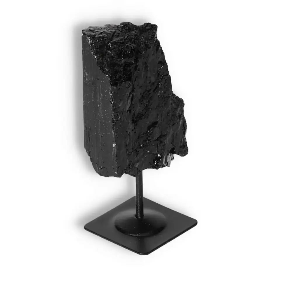 Rough Black Tourmaline with Metal Stand M from Sylvia Crystals for cleansing energy and spiritual renewal.