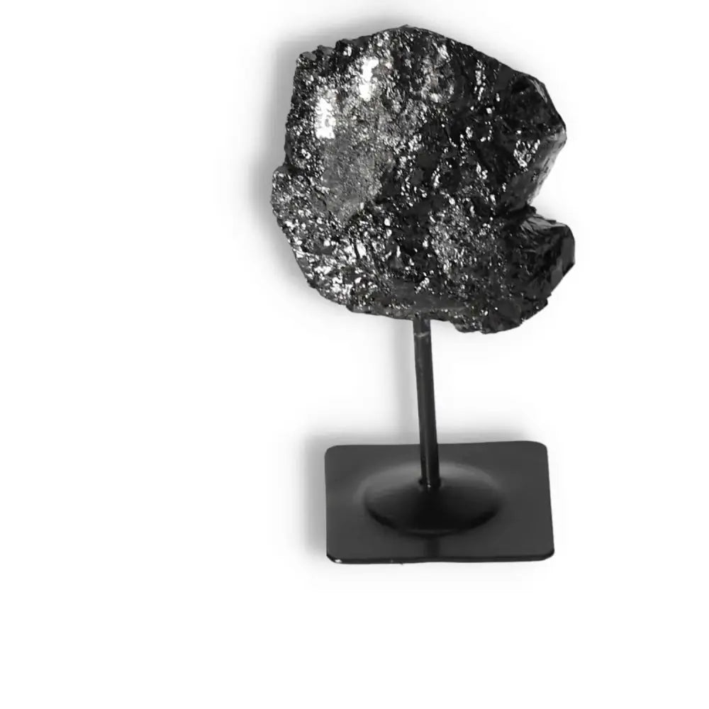Rough Black Tourmaline with Metal Stand M, offering luxury and spiritual grounding by Sylvia Crystals