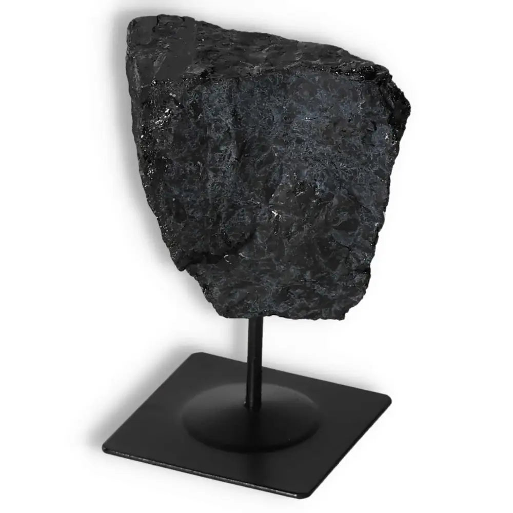 Rough Black Tourmaline with Metal Stand by Sylvia Crystals, ideal for luxury decor and energy purification