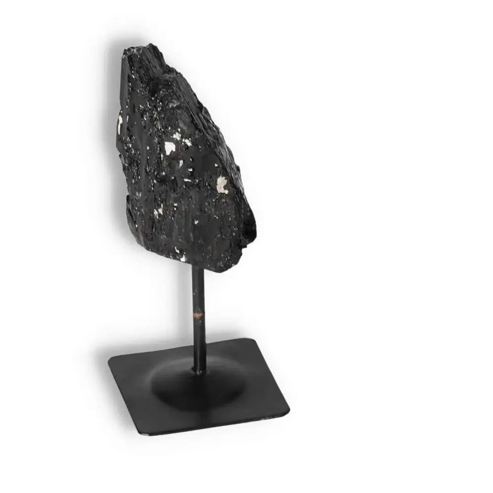 Rough Black Tourmaline on Metal Stand S from Sylvia Crystals, showcasing luxurious and spiritual allure.