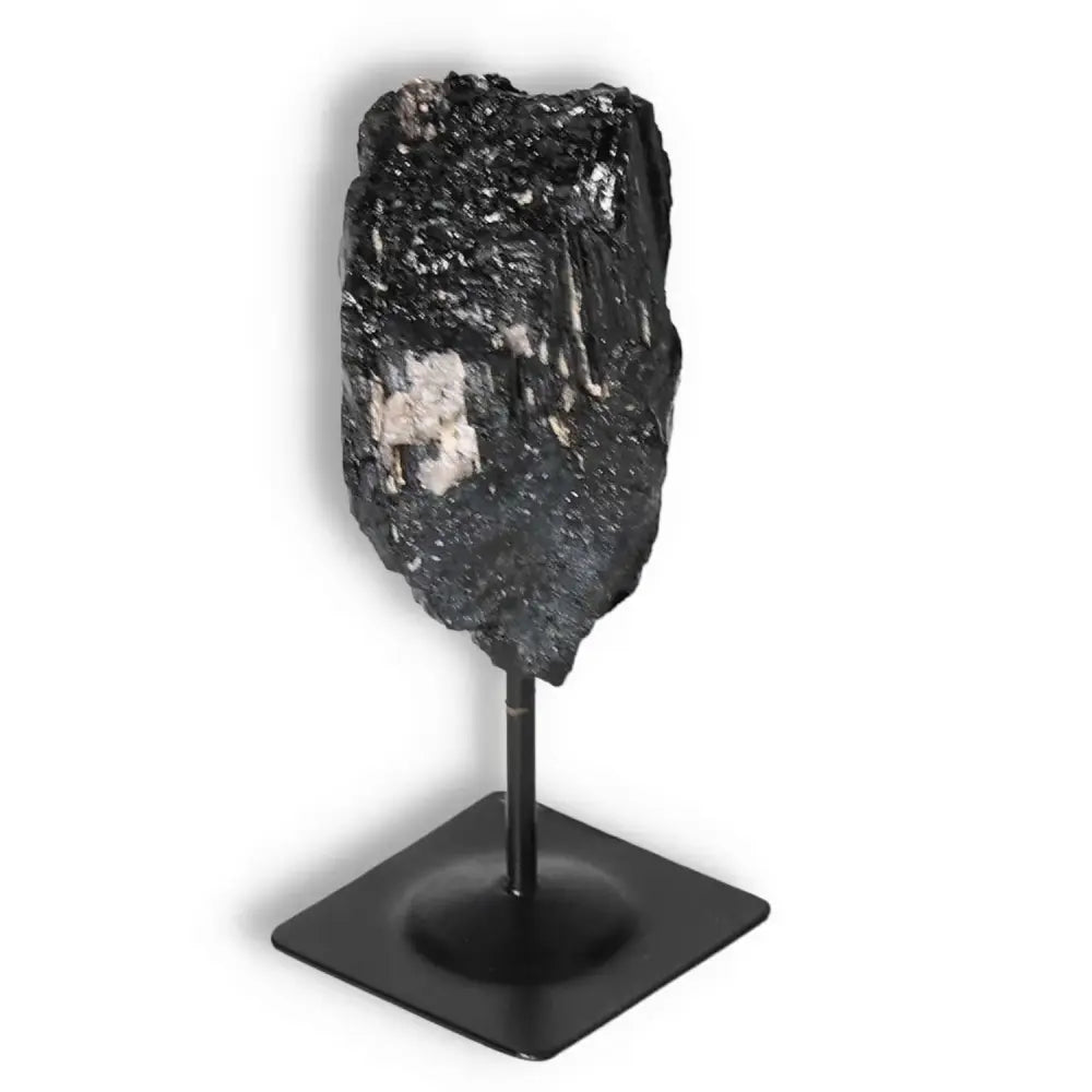 Rough Black Tourmaline with Metal Stand S by Sylvia Crystals, ideal for balance and positivity. Luxurious, spiritual décor piece.