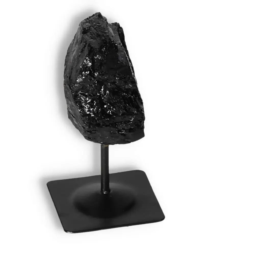 Premium Rough Black Tourmaline on Metal Stand by Sylvia Crystals, perfect for energy cleansing and luxury decor.