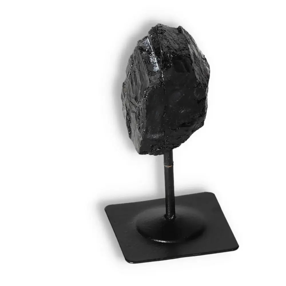 Rough Black Tourmaline with Metal Stand S from Sylvia Crystals collection, perfect for luxury and positive energy enhancement.