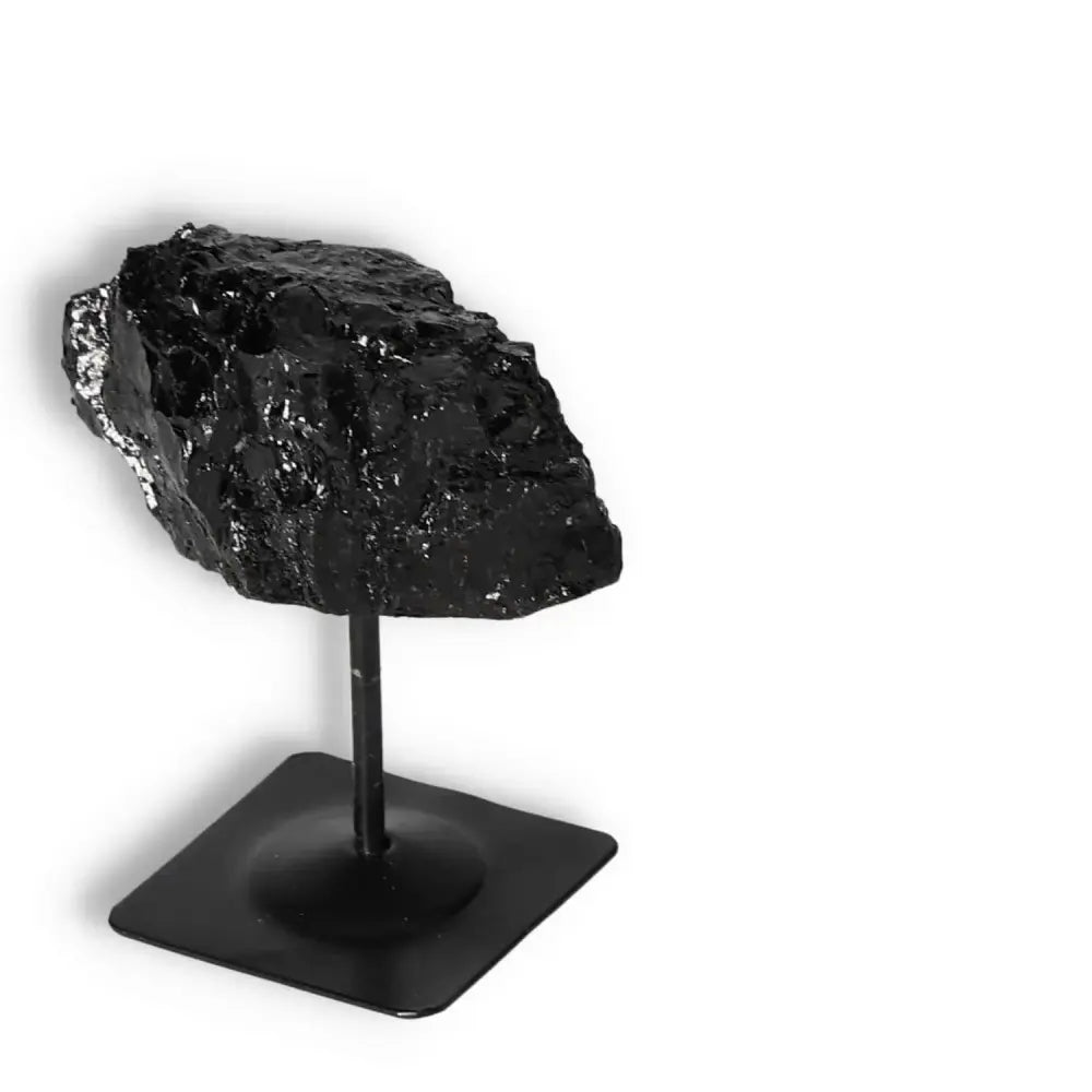 Rough Black Tourmaline on Metal Stand S by Sylvia Crystals, for spiritual cleansing and energy transformation in any space.