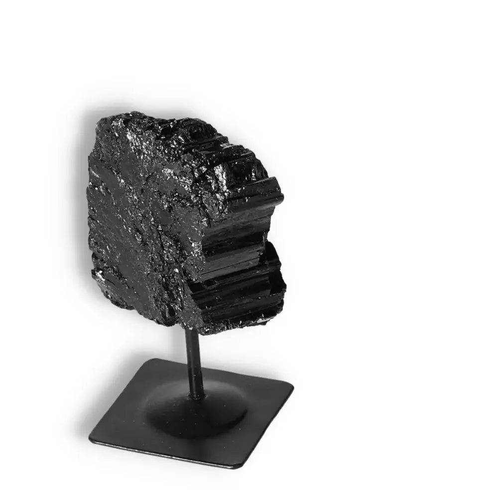 Rough Black Tourmaline with Metal Stand S, energy transformation decor from Sylvia Crystals, neutralizes negative energies.