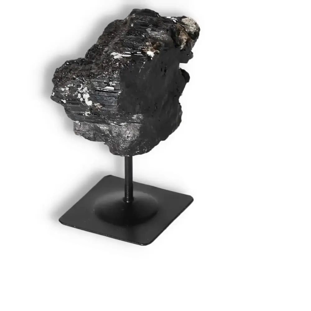 Rough Black Tourmaline with Metal Stand S, ideal for luxury and spiritual harmony at Sylvia Crystals.