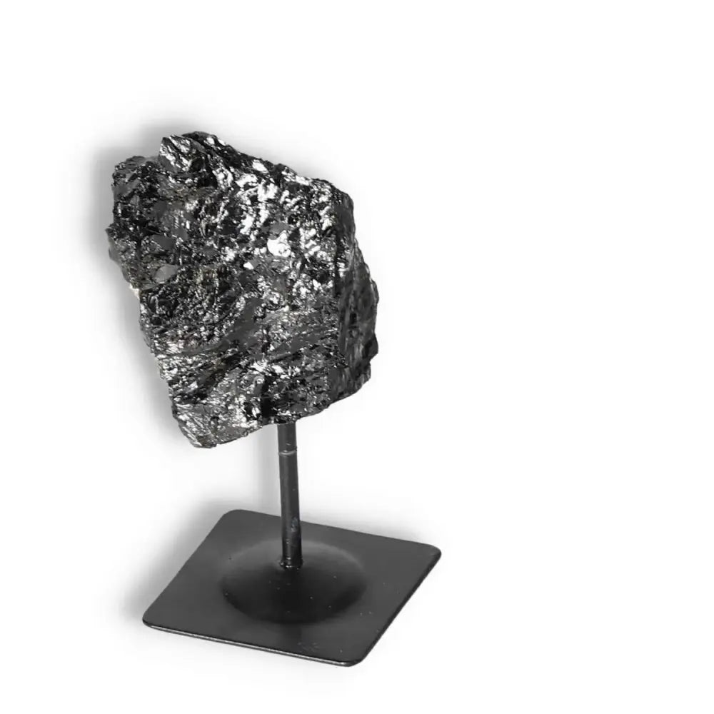 Rough Black Tourmaline with Metal Stand, premium quality crystal from Sylvia Crystals, designed to cleanse negative energies.