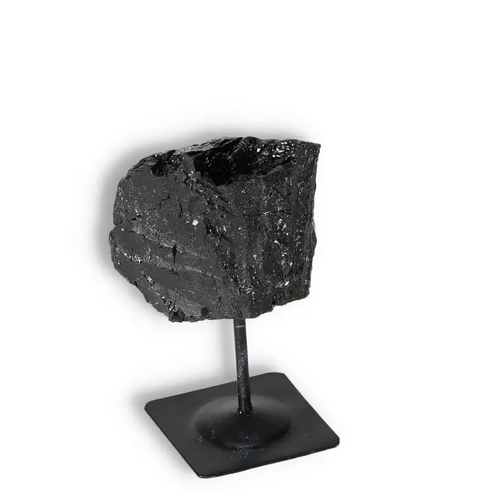 Rough Black Tourmaline on Metal Stand, Sylvia Crystals' cleansing and grounding gemstone, high-quality and authentic display piece.