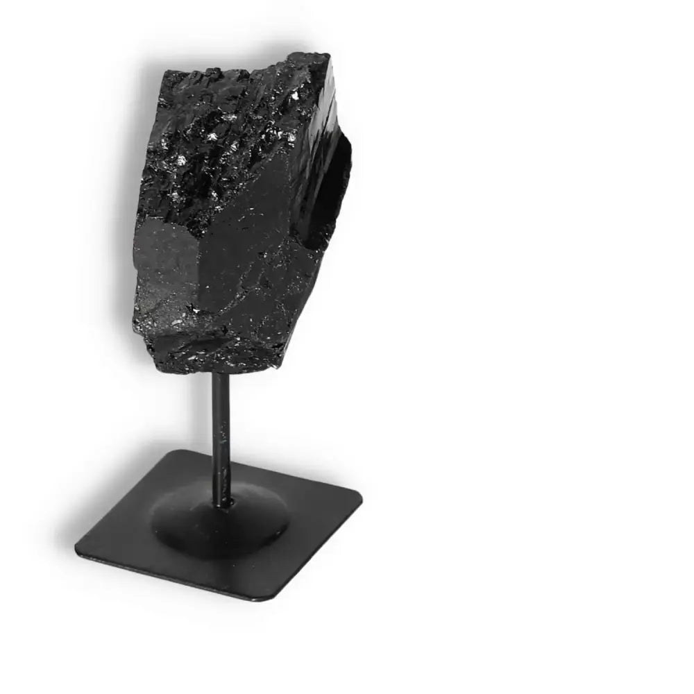 Rough Black Tourmaline with Metal Stand S by Sylvia Crystals, offering spiritual healing and negative energy cleansing.