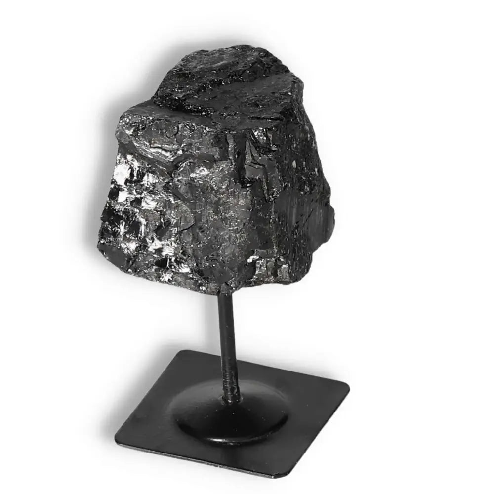 Rough Black Tourmaline on Metal Stand S by Sylvia Crystals, showcasing its unique cleansing properties and premium quality.
